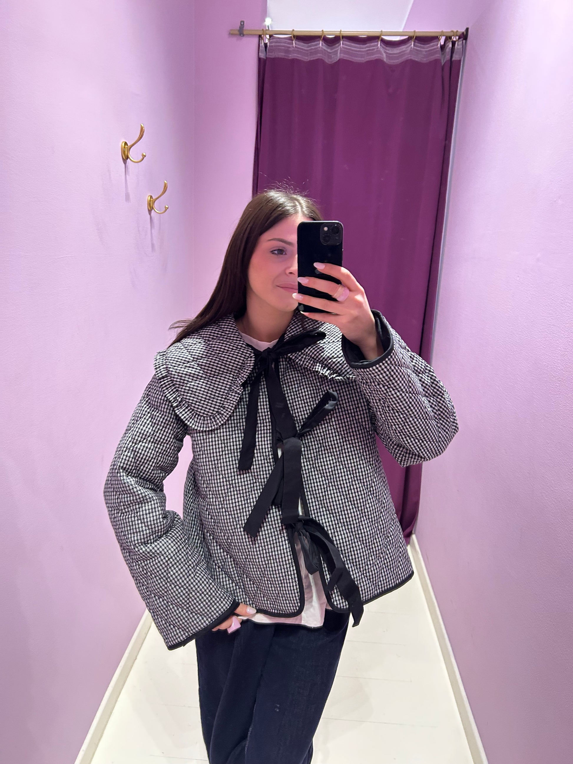 Giacca trapuntata con colletto a quadri neri